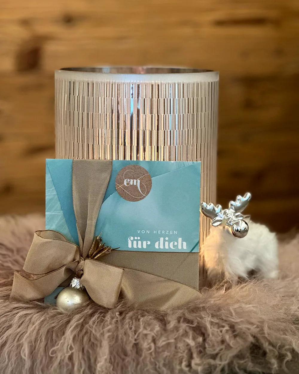 Geschenkgutschein von CM Kosmetik mit Schleife